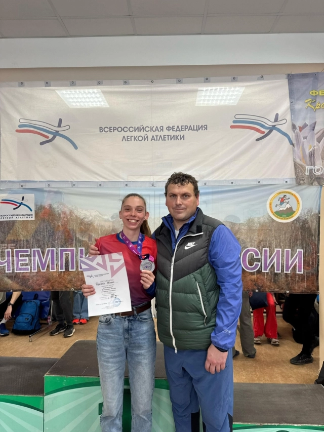 А. Ильина с тренером
